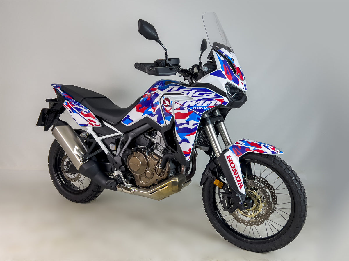 Africa Twin 1100 con kit de adhesivos completo (Diseño Kirian Mirabet Blanco, azúl y rojo)